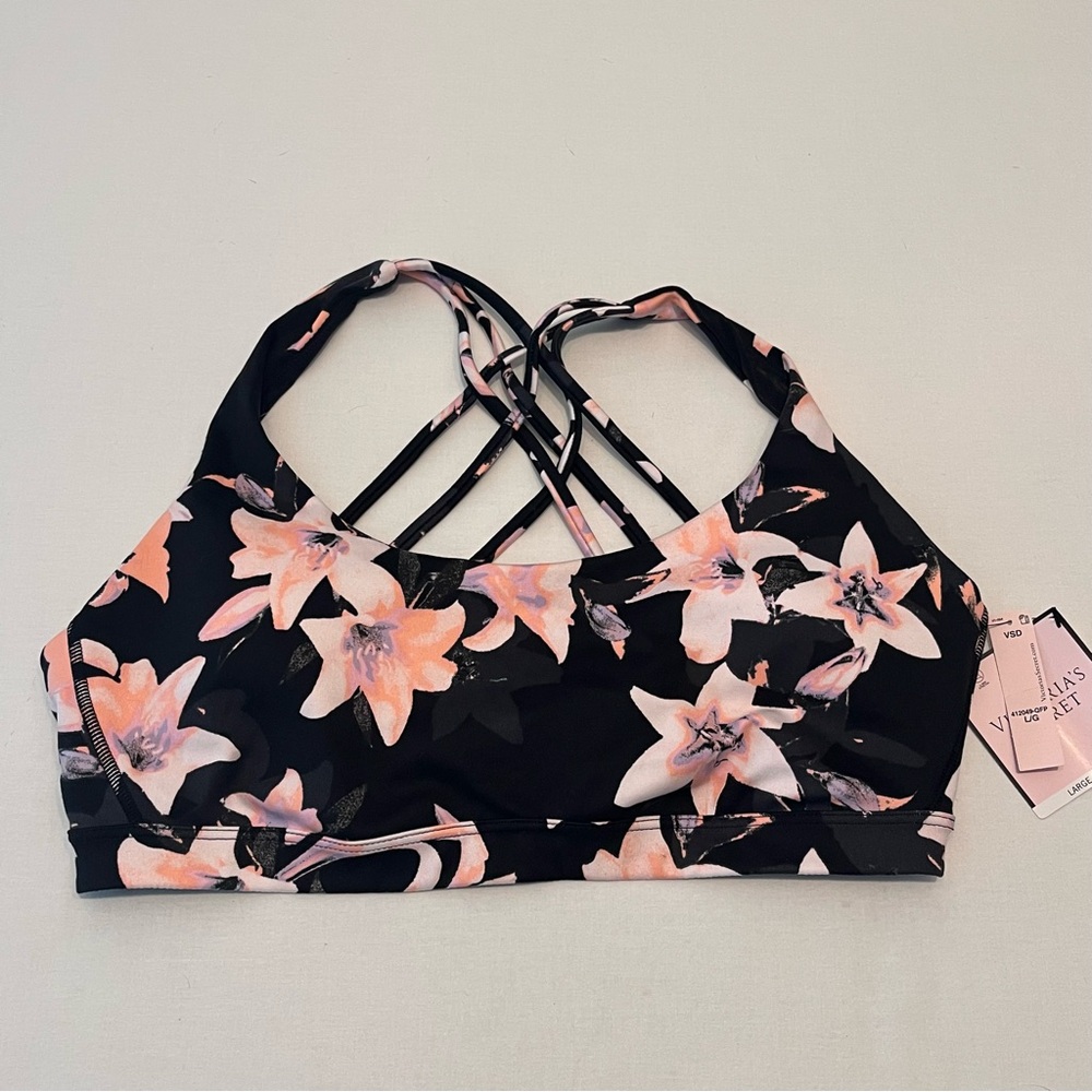 Victoria’s Secret Minimum Support Sport Bra in a Black Floral Print size L NEW